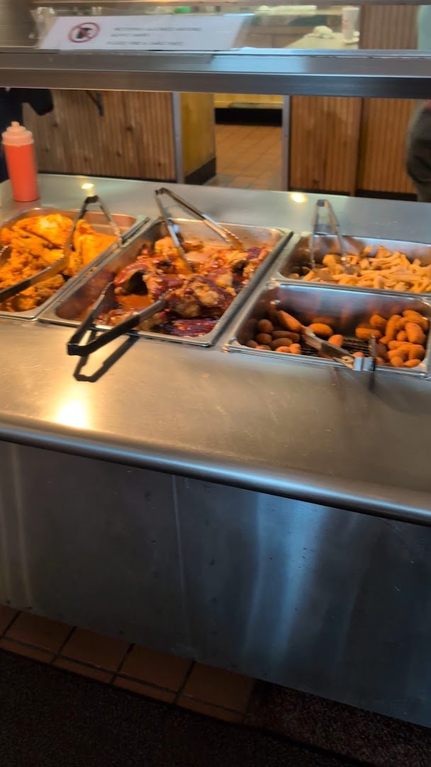 Plates of Southern food on a buffet counter