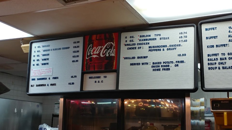 Dessert menu featuring peach cobbler and homemade rolls